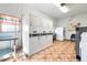 Well-lit laundry room featuring multiple high-capacity washer and dryer units for residents' convenience at 2326 Canal Dr # G25, Bradenton, FL 34207