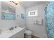 Bathroom featuring modern fixtures, shower, and a sink with vanity at 2408 Avenue B, Bradenton Beach, FL 34217