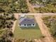 Aerial view of a new construction home with grass at 302 Liden St, Port Charlotte, FL 33953