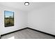 Bright bedroom with large window providing natural light and outdoor views at 302 Liden St, Port Charlotte, FL 33953