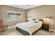 Cozy bedroom featuring neutral walls, tile floor and a window with blinds at 4302 Turnberry Ct, Bradenton, FL 34210