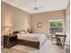 Comfortable bedroom with neutral walls and a ceiling fan at 4302 Turnberry Ct, Bradenton, FL 34210