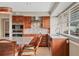 Open kitchen featuring stainless steel appliances, granite countertops, and an island at 4302 Turnberry Ct, Bradenton, FL 34210