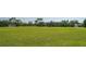 Expansive green sports field perfect for various recreational activities, equipped with soccer goals at 4718 Claremont Park Dr, Bradenton, FL 34211