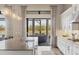 Bright kitchen features quartz counters, stainless appliances and views of the lake at 4719 Cabreo Ct, Bradenton, FL 34211