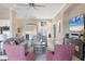 Spacious living room with comfortable seating, neutral tones, and open access to other living areas at 4719 Cabreo Ct, Bradenton, FL 34211