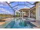 Inviting screened-in pool and outdoor lounge area featuring a covered patio with lovely views at 4719 Cabreo Ct, Bradenton, FL 34211