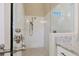 Walk-in shower with beautiful tile, sleek fixtures, and a seamless glass enclosure at 4719 Cabreo Ct, Bradenton, FL 34211