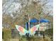 View of a colorful butterfly art sculpture in a community park at 4907 Torrey Pines Run, Bradenton, FL 34211