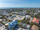 Aerial view of the property with the beach in the background and other neighborhood homes around the property at 520 Spring Ave # A, Anna Maria, FL 34216