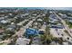 Aerial view of the property with the beach and neighborhood homes surrounding the area at 520 Spring Ave # A, Anna Maria, FL 34216