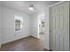 Bright bedroom with new flooring, closet space, and a window for natural light at 520 Spring Ave # A, Anna Maria, FL 34216