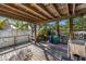 Spacious covered back deck perfect for outdoor dining and relaxation at 520 Spring Ave # A, Anna Maria, FL 34216