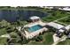 Aerial view of a pool, showcasing the recreational amenities and landscaped surroundings at 6608 13Th Avenue W Dr, Bradenton, FL 34209