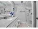 Updated bathroom with a glass shower, modern vanity, and stylish decor at 6608 13Th Avenue W Dr, Bradenton, FL 34209