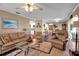 Comfortable living room with hardwood floors and open floorplan access to other rooms at 6608 13Th Avenue W Dr, Bradenton, FL 34209