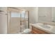 Clean bathroom featuring shower with glass door, and a vanity with single sink at 6961 Scrub Jay Dr, Sarasota, FL 34241