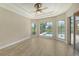 Spacious bedroom with natural light and pool view at 6961 Scrub Jay Dr, Sarasota, FL 34241