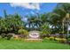 Beautifully landscaped Red Hawk Reserve community entrance sign at 6961 Scrub Jay Dr, Sarasota, FL 34241