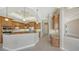 Modern kitchen with stainless steel appliances, granite counters, and wood cabinetry at 6961 Scrub Jay Dr, Sarasota, FL 34241