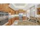 Well-appointed kitchen showcasing stainless steel appliances and ample counter space at 6961 Scrub Jay Dr, Sarasota, FL 34241