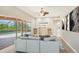 Comfortable living room with views of the pool and outdoor living area at 6961 Scrub Jay Dr, Sarasota, FL 34241