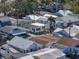 Aerial view of a home circled in yellow, located in a quaint, densely populated neighborhood at 7 High St, Bradenton, FL 34208