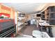 Spacious unfinished basement with shelving units and work area at 7 High St, Bradenton, FL 34208