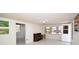 Bright living room featuring new windows, white walls, and modern ceiling lighting at 7 High St, Bradenton, FL 34208