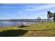 A waterfront view with a long pier featuring a gazebo and a relaxing place to enjoy nature at 7 High St, Bradenton, FL 34208