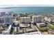 Aerial view of high-rise buildings with views of the ocean and city at 750 N Tamiami Trl # 407, Sarasota, FL 34236