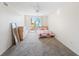 Bright bedroom featuring a sliding glass door to the patio at 750 N Tamiami Trl # 407, Sarasota, FL 34236