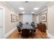 Professional conference room with leather chairs, a large table, and ample lighting at 750 N Tamiami Trl # 407, Sarasota, FL 34236