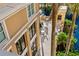 Overhead angle of exterior patio featuring a fountain and water at 750 N Tamiami Trl # 407, Sarasota, FL 34236