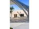 Modern outdoor seating area with tables and chairs under architectural canopy at 750 N Tamiami Trl # 407, Sarasota, FL 34236