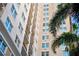 Luxury high rise with private balconies and palm trees on an eye catching facade at 750 N Tamiami Trl # 407, Sarasota, FL 34236