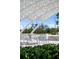 Modern outdoor seating area with tables and chairs under shade at 750 N Tamiami Trl # 407, Sarasota, FL 34236