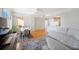 Spacious living space featuring dining area, modern kitchen and comfortable seating at 750 N Tamiami Trl # 407, Sarasota, FL 34236
