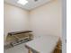 Serene massage room equipped with two treatment tables for relaxation and wellness at 750 N Tamiami Trl # 407, Sarasota, FL 34236
