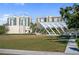 Lush park area with a modern shaded structure, perfect for outdoor activities and relaxation at 750 N Tamiami Trl # 407, Sarasota, FL 34236