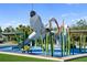 Fun and safe playground featuring creative bird-themed structures and colorful turf at 750 N Tamiami Trl # 407, Sarasota, FL 34236