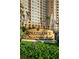 Renaissance at Rosemary Place sign with water feature and mature landscaping at 750 N Tamiami Trl # 407, Sarasota, FL 34236