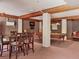 Finished basement featuring a pool table, dining area, and exposed beams at 7717 27Th W Ave, Bradenton, FL 34209