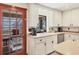 Bright, efficient kitchen equipped with stainless steel appliances and plenty of counter space at 7717 27Th W Ave, Bradenton, FL 34209