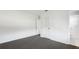 Bedroom with neutral carpet, white walls, and closet space at 8003 Herbison Ave, North Port, FL 34287