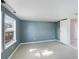 Bright bedroom with neutral paint, tile flooring, and natural light from a window at 8003 Herbison Ave, North Port, FL 34287