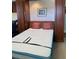 Bedroom featuring a Murphy bed with built in cabinets, offering flexible living space and storage at 935 Shasta Rd, Venice, FL 34293