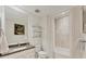 Bathroom features a single sink vanity and tub shower at 10520 Boardwalk Loop # 504, Lakewood Ranch, FL 34202
