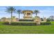 Welcome to Sandhill Preserve on Palmer Ranch, featuring lush landscaping at the community entrance at 11050 Sandhill Preserve Dr, Sarasota, FL 34238