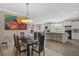 Open-concept dining area connects seamlessly to the kitchen and living spaces at 11050 Sandhill Preserve Dr, Sarasota, FL 34238